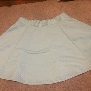 Tiffany blue skirt.